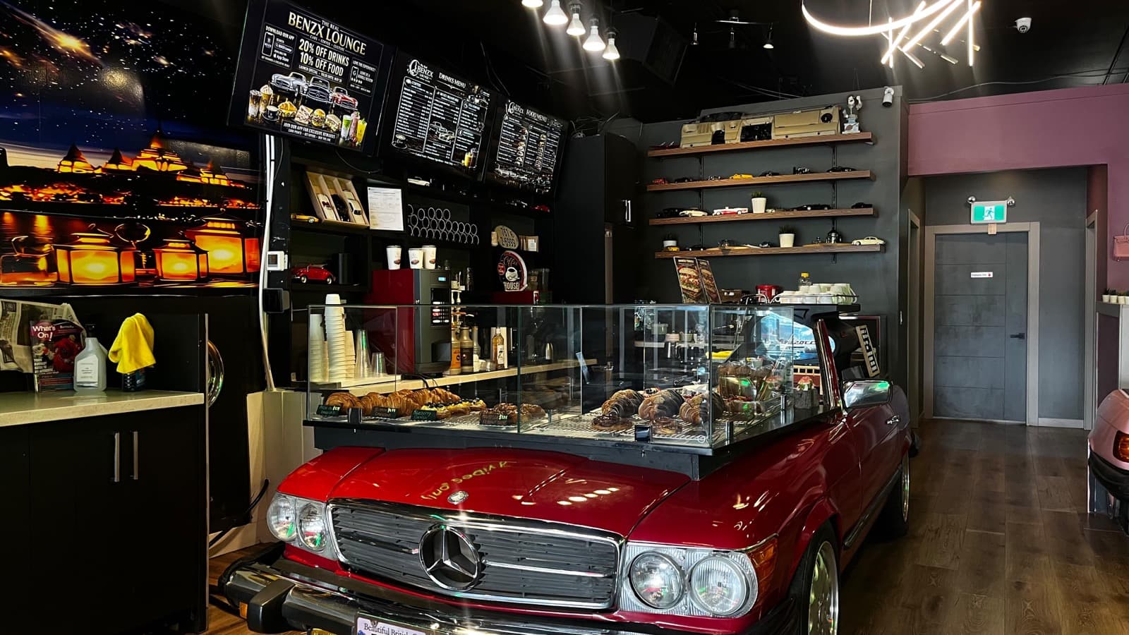 Inside BenzX Lounge café counter and pastry display